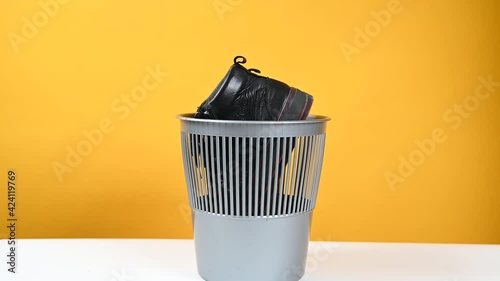 Shoes are thrown into the trash
