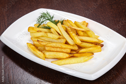 French fry potato heap in the plate