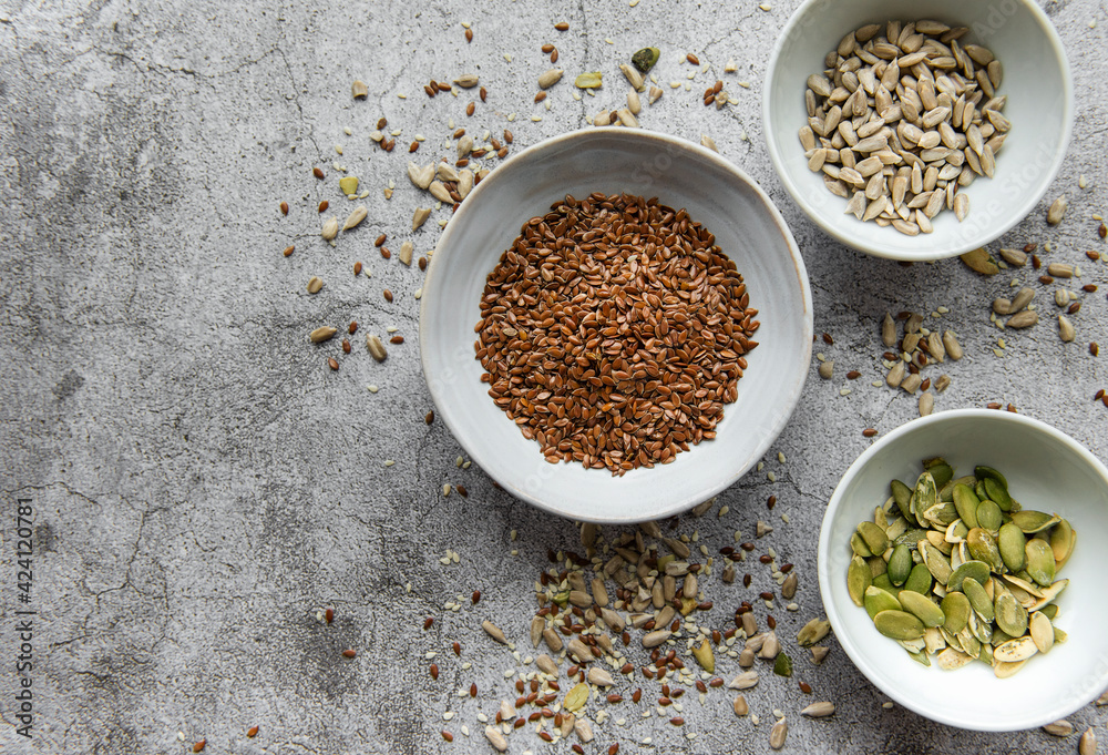 Mix different seeds for a healthy salad Mix different seeds for a healthy salad