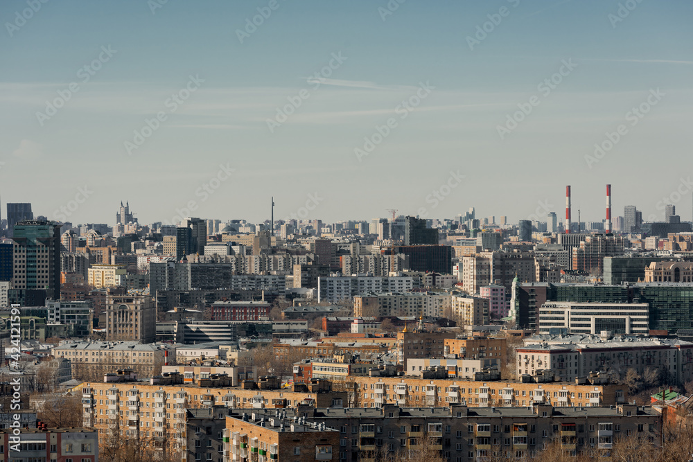 Panoramic view of the big city. Roofs of houses to the horizon. Large metropolis Panoramic view of the big city. Roofs of houses to the horizon. Large metropolis