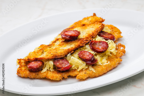 potato pancake filled with cabbage and sausage