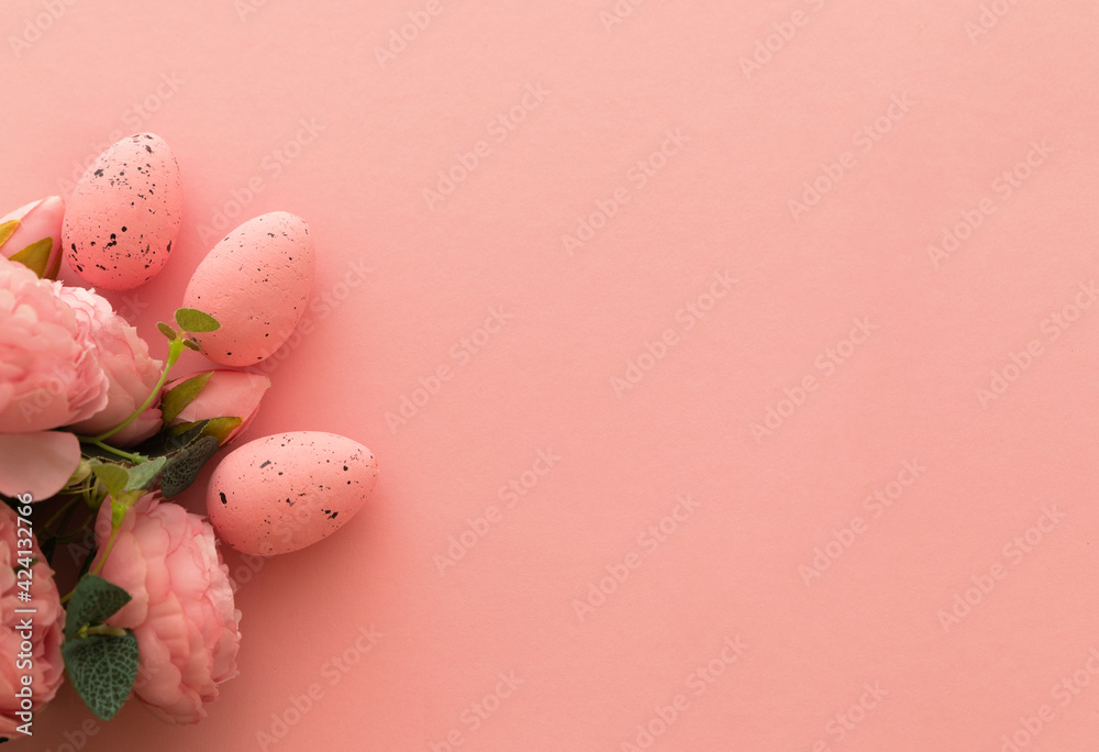 Pink eggs with flowers peonies on pastel pink background. Happy Easter. Top view. Flat lay, copy space Pink eggs with flowers peonies on pastel pink background. Happy Easter. Top view. Flat lay, copy space