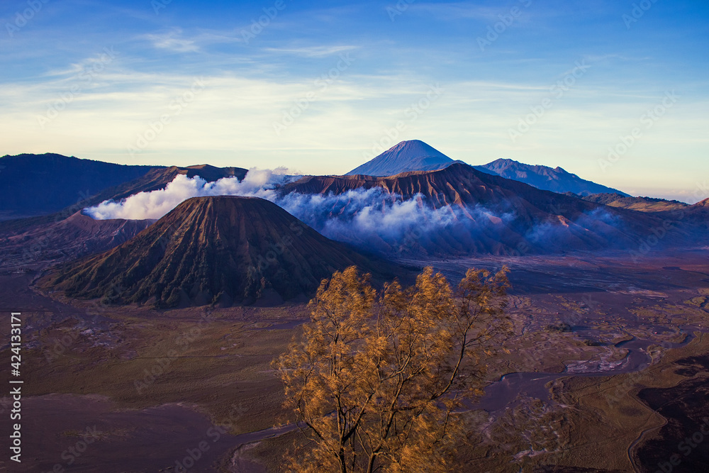 Spectacular Bromo Tengger Semeru National Park on East Java, Indonesia. Aerial view of volcano Bromo, Mount Semeru and Mount Batok from Penanjakan view point