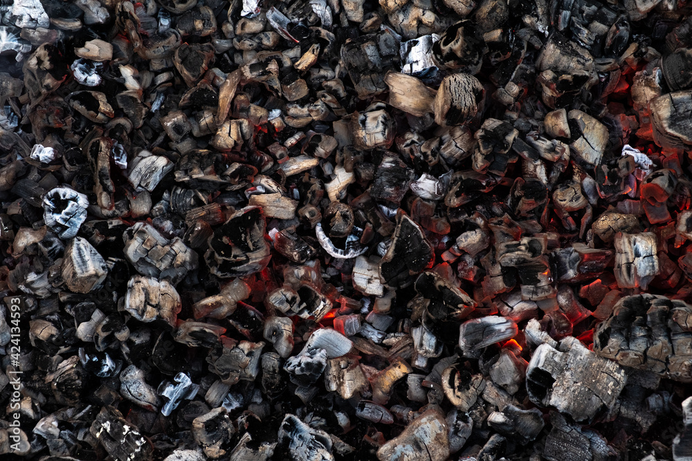 Background of hot hot coals made of wood. Top view. Selective focus. Background of hot hot coals made of wood. Top view. Selective focus.