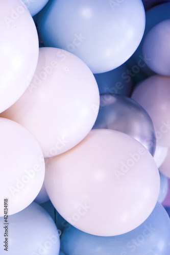 Background of multicolored balloons of nude colors. Abstract background. Various colorful party balloons