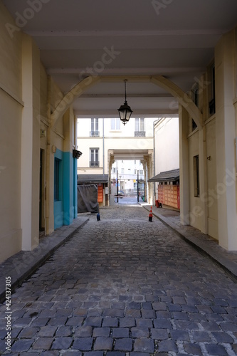 The small typical parisian street named "Cour d'Alsace-Lorraine". Paris, the 29th march 2021.