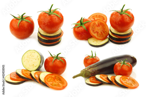 sliced and mixed tomato and Suriname aubergine (eggplant) on a white background