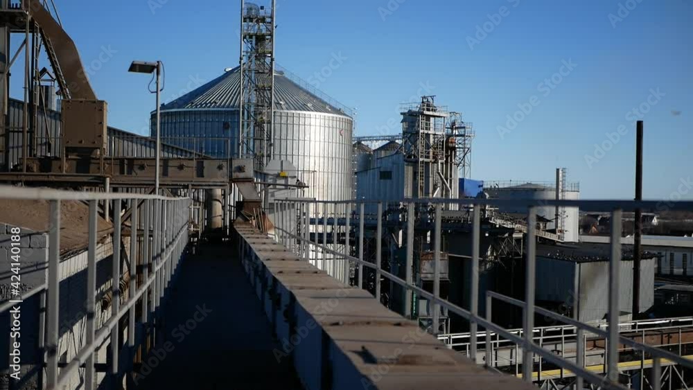 industrial territory of the manufactory overlooking huge silos industrial territory of the manufactory overlooking huge silos