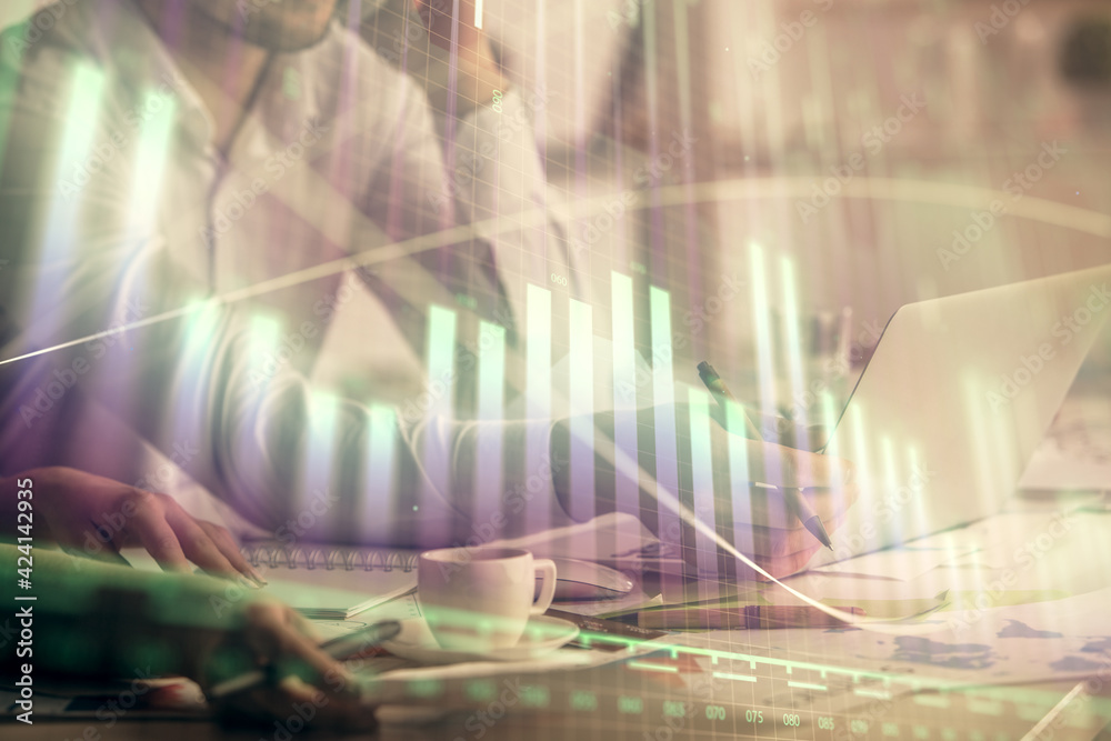 Multi exposure of man and woman working together and financial chart hologram. Business concept. Computer background. Multi exposure of man and woman working together and financial chart hologram. Business concept. Computer background.