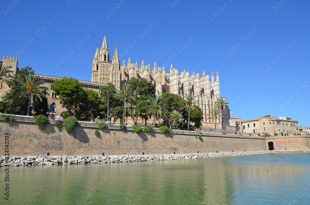 Beautiful antique cathedral by the sea in Mallorca. Summer town by the sea. Mallorca is a beautiful island. Beautiful cathedral.	