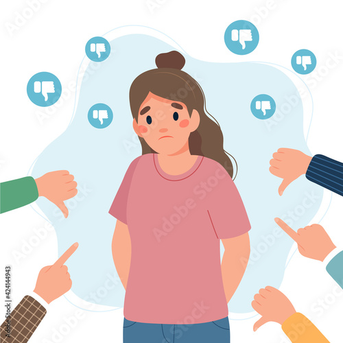 Canvas Print Sad young woman surrounded by hands with thumbs down and pointing fingers