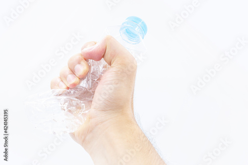 hand of a man holding a water bottle