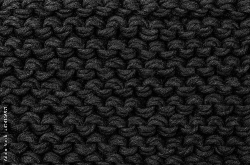 Close-up texture of knitted fabric. Knitted background Close-up texture of knitted fabric. Knitted background
