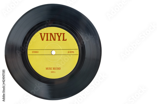 Closeup view of realistic gramophone vinyl record or phonograph record with yellow label. Black musical single play disc 7 inch 45 rpm spiral groove. Stereo sound record. Isolated on white background. photo