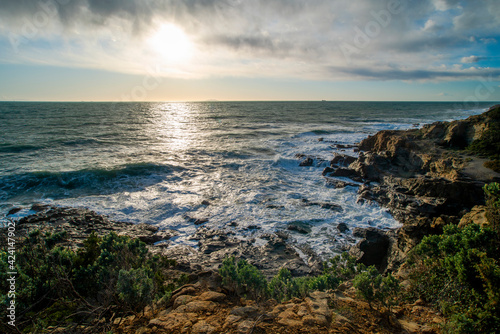 A rocky coast with crashing waves