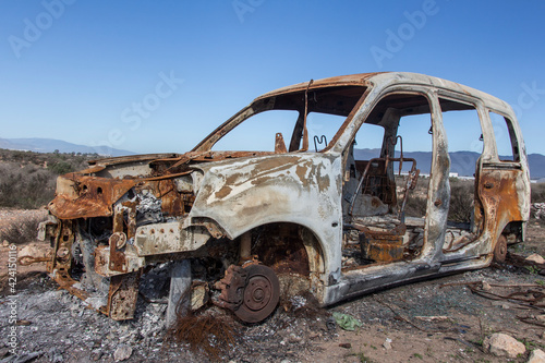 burned car abandoned, car destroyed bo fire, mini van