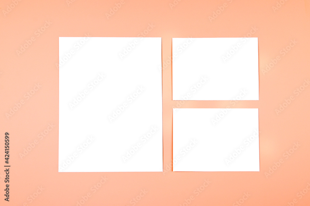 Empty cards on pastel orange background. Mockup template. Empty cards on pastel orange background. Mockup template.