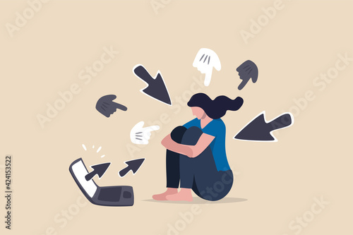 Cyber bullying, internet abuse or online troll, social media problem with hater comments concept, depressed teenager girl sitting alone with computer laptop and mouse hand cursors pointing on her.