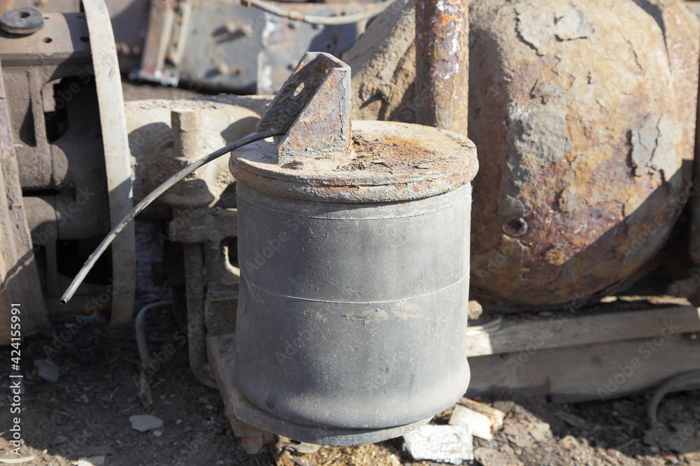 Old heavy truck rear axle shock absorber air cylinder, pneumatic car suspension maintenance service
