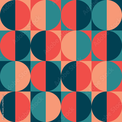 Seamless pattern vector design of a mosaic tile of circles, half circles and squares in a retro, hippie and minimalist style with desaturated blue and red colors