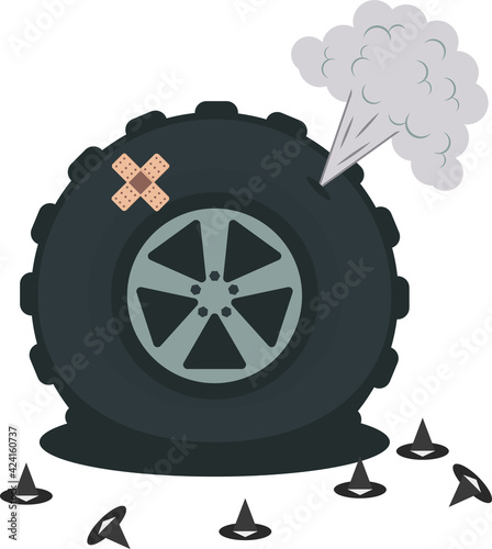 Wheel. A large wheel from a tractor or truck. Wheel puncture.