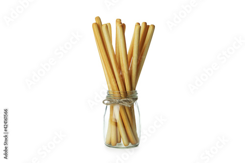 Принти на полотні Glass jar with grissini breadsticks isolated on white background