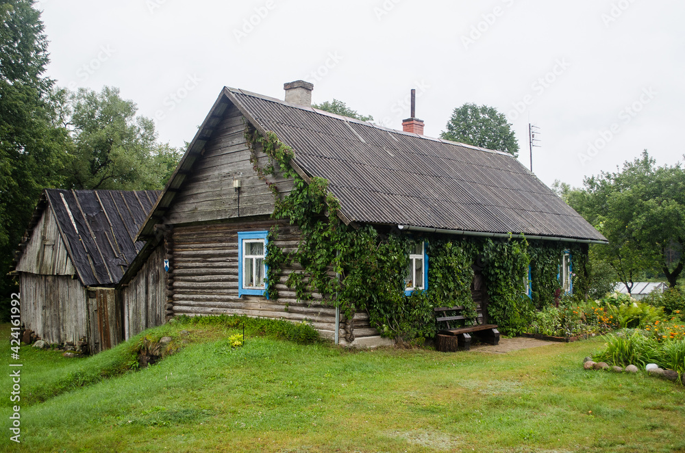 Russian Old Believers village in Latvia, Slutiski. Beautiful wooden house. Russian Old Believers village in Latvia, Slutiski. Beautiful wooden house.
