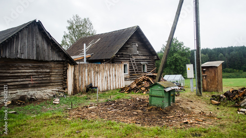 Russian Old Believers village in Latvia, Slutiski. Beautiful wooden house. photo