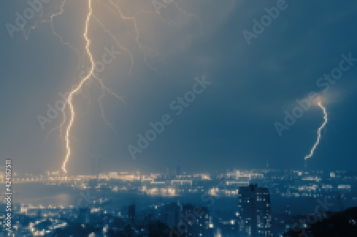 Lightning storm over night city. Mosaic effect.