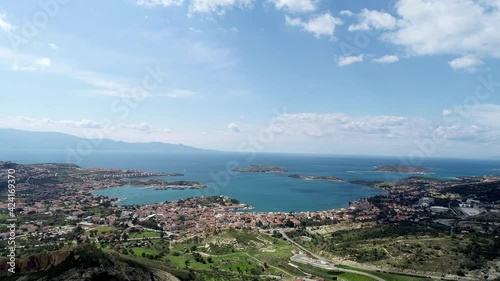 Foca izmir drone aerical wiev sea beautiful holiday trip. Drone view of beautiful seamless never ending footage while turquiose sea waves breaking on sandy coastline. Aerial shot of golden beach. photo