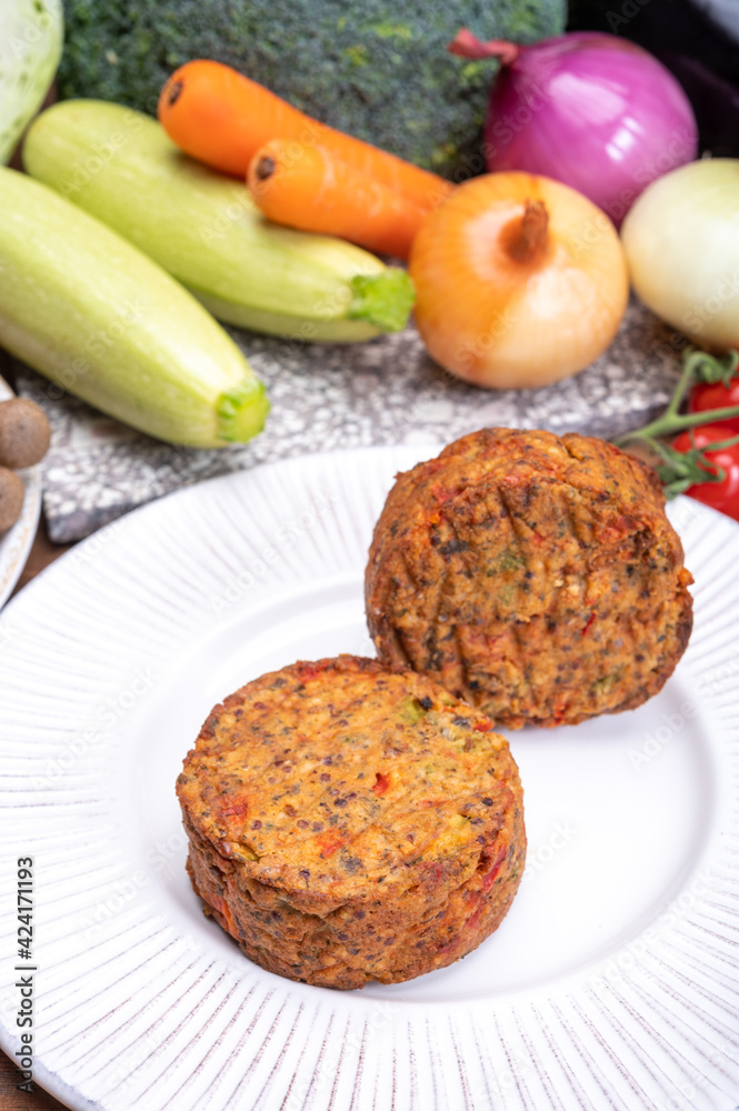Round vegetarian patties or burgers made from grains, vegetables and legumes