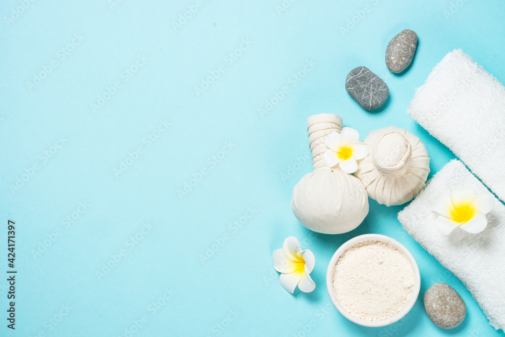 Spa herbal compressing balls on blue background. Spa herbal compressing balls on blue background.