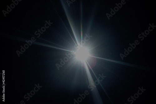 Abstract lens flare, lighting effect elements, solar energy, sun light on black background