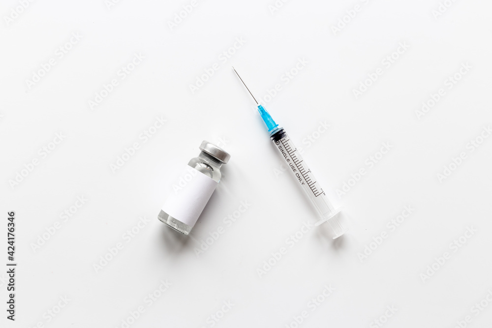 Vaccine in vial bottle with syringe. Vaccination concept
