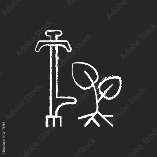 Weed puller chalk white icon on black background. Garden and lawn care. Pulling tool. Removing unwanted deep-rooted weeds. Getting dandelions, thistles rid. Isolated vector chalkboard illustration