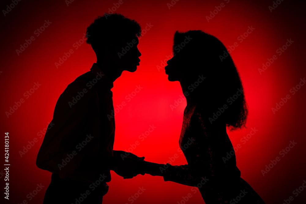 Photo of young couple hold hands enjoy date passion romance love feelings kiss isolated over gradient color background