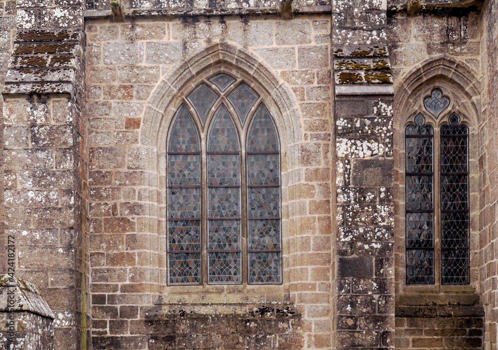 Windows in stone wall