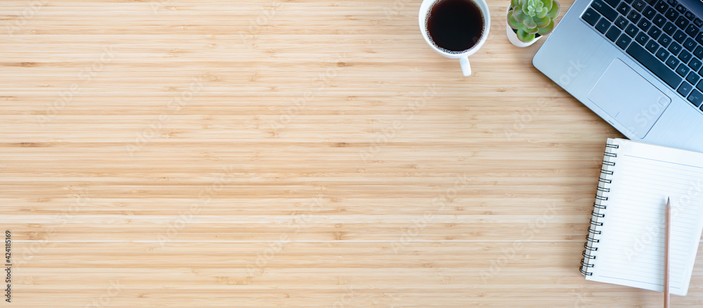 flat lay composition with notebook, pen, coffee, plant, laptop on wood background. flat lay composition with notebook, pen, coffee, plant, laptop on wood background.