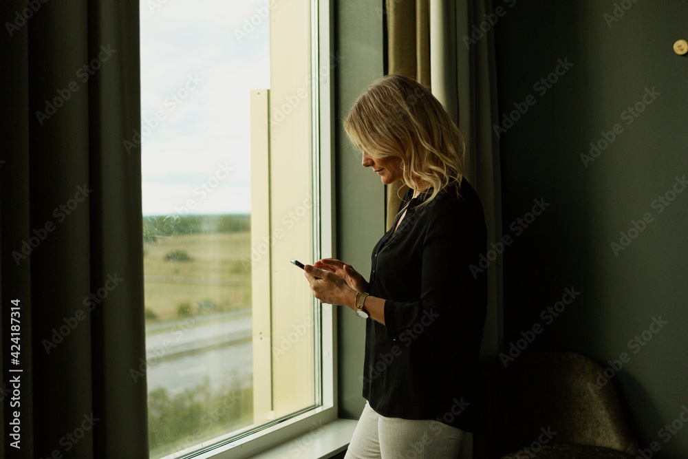 Woman using cell phone Woman using cell phone