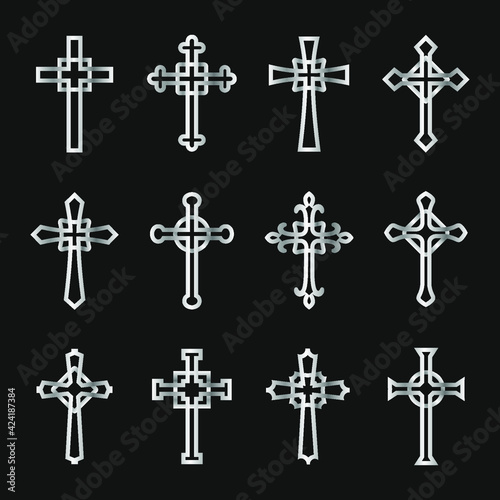set of silver crosses on black background