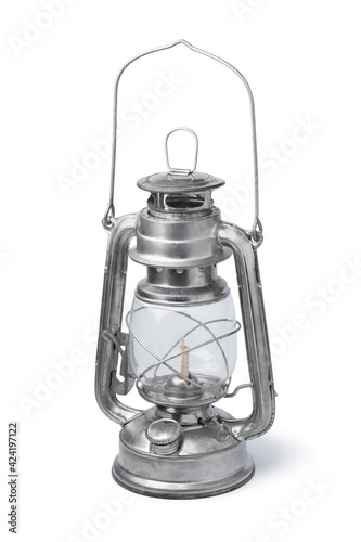 Single classic metal oil lamp lantern isolated on white background 
