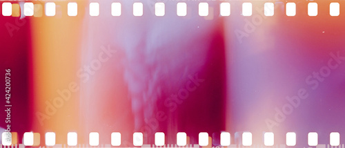 real film strip texture with burn light leaks, abstract background © elovich