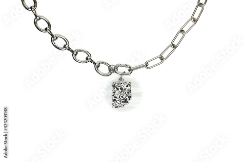 Close up of stylish chain with pendant isolated on white. Woman trendy fashion accessories. Fashionable jewelry.