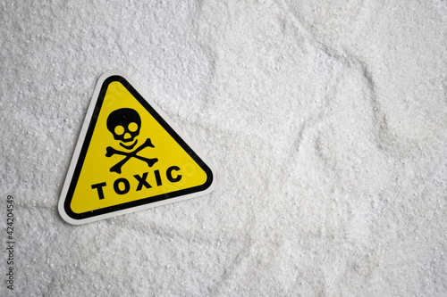 white chemical powder with toxic sign