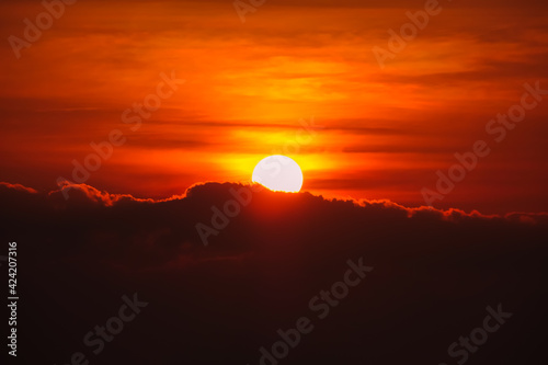 Beautiful sunrise behide the cloud and twilight sky, silhouette cloud