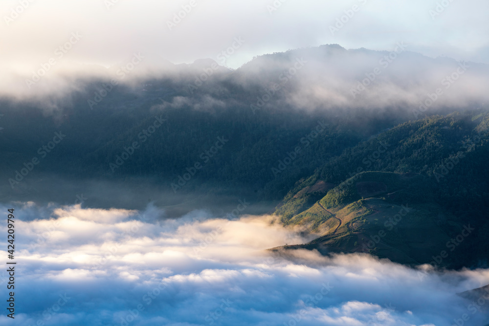 Ta Xua is a famous mountain range in northern Vietnam. All year round, the mountain rises above the clouds creating cloud inversions. Ta Xua is a famous mountain range in northern Vietnam. All year round, the mountain rises above the clouds creating cloud inversions.