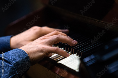 Hands of a musician playing the celesta close up