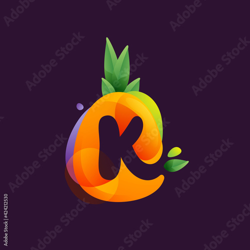 Vivid Pineapple fruit with Letter K negative space logo.