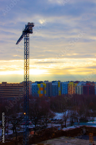 Sunset in the village Otradnoe. View on the micro-city 