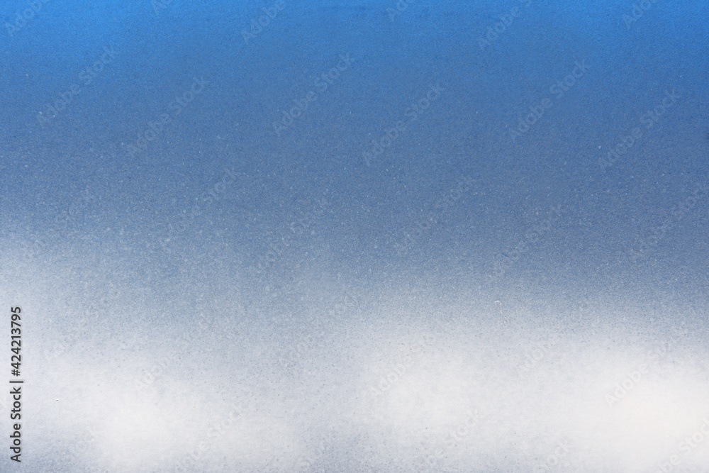 blue and white spray paint on a paper background blue and white spray paint on a paper background
